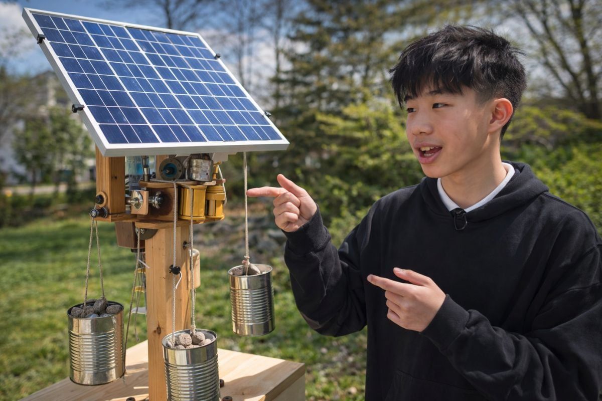 A gravity-driven seesaw turns dripping water into solar tracking
