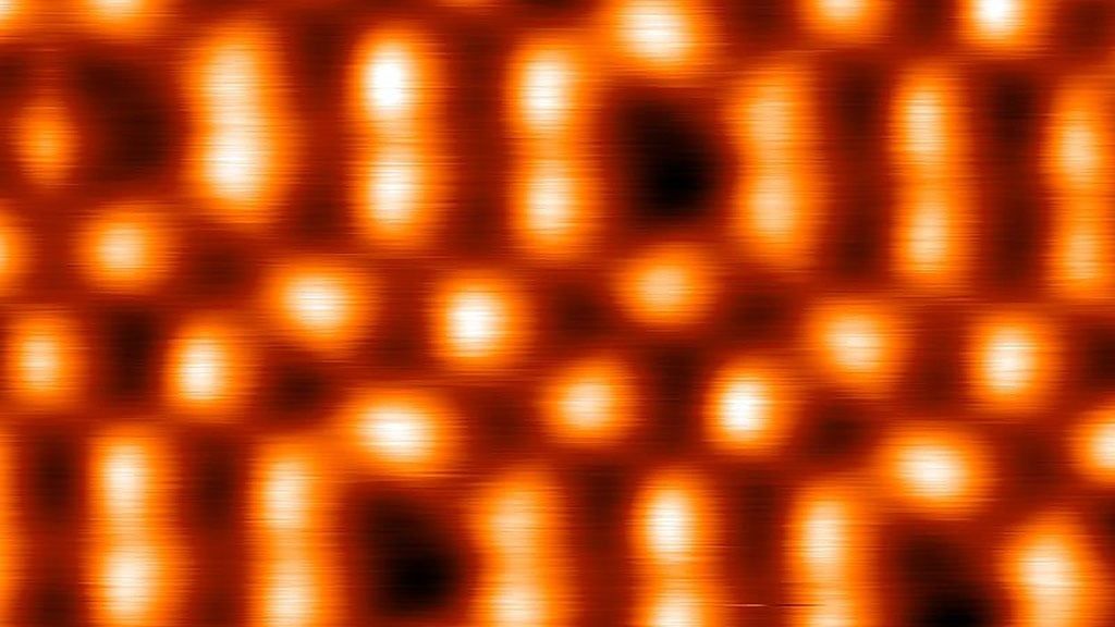 The automated platform constructed an artificial graphene lattice by arranging molecules into a symmetrical grid on a copper base.