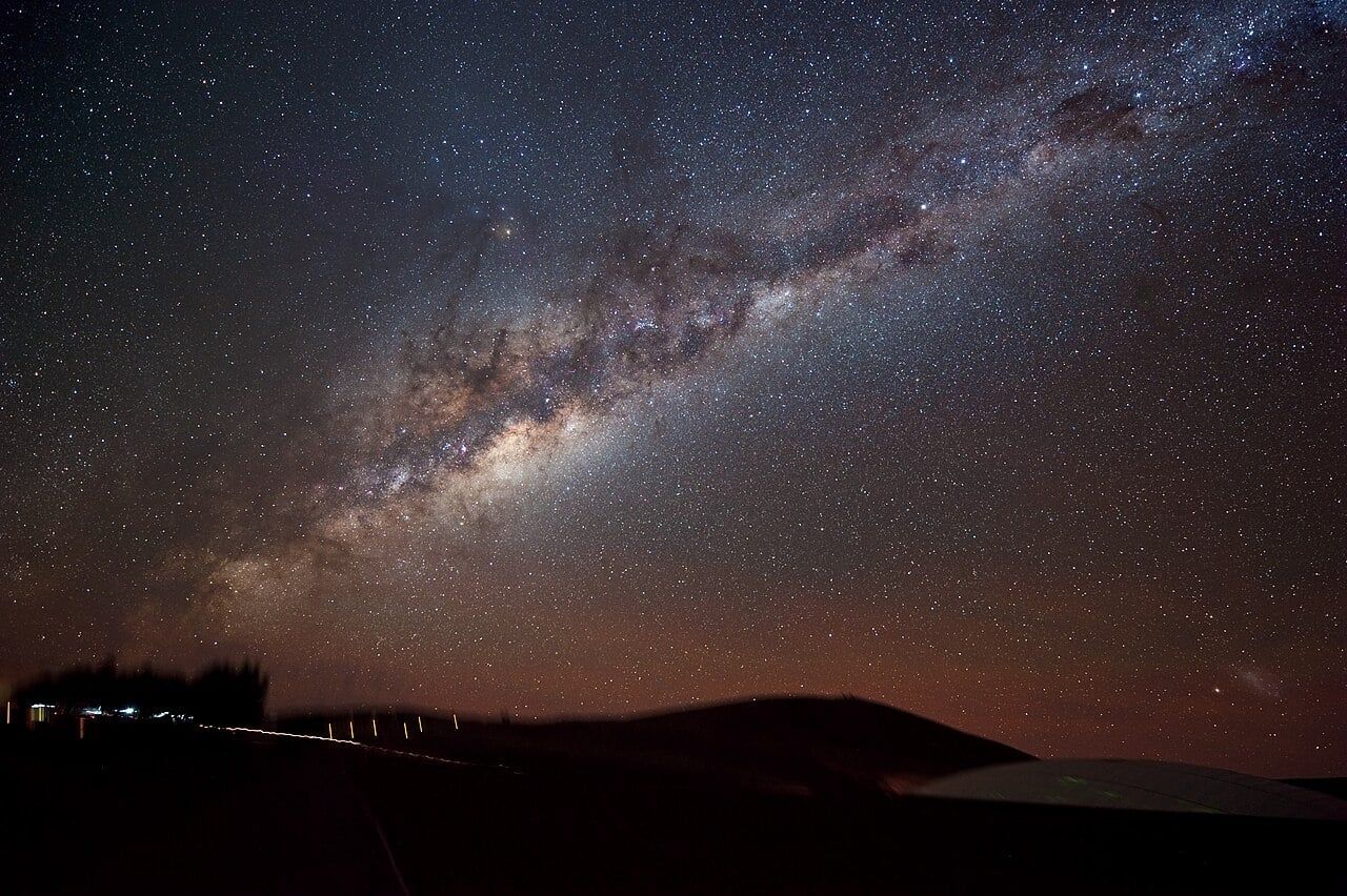 Four giant exoplanets orbit a distant star across twelve years