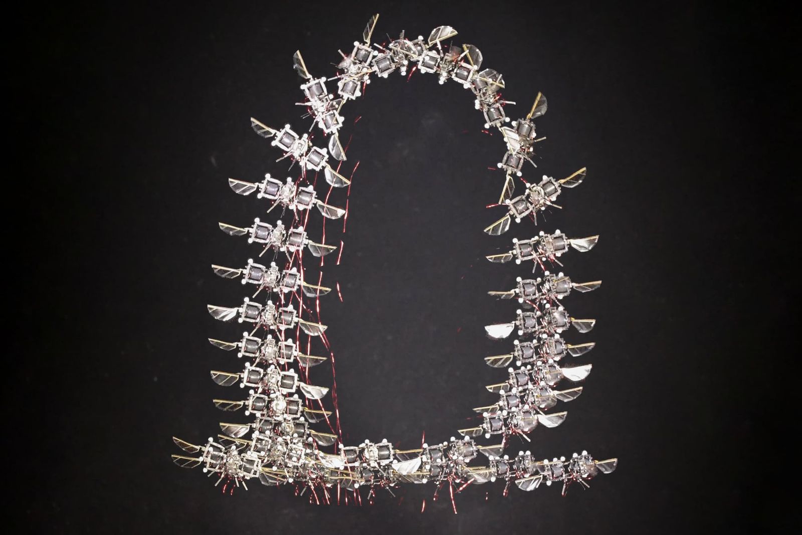 A polymer foot membrane lets miniature robots draw electrical power from metal floors