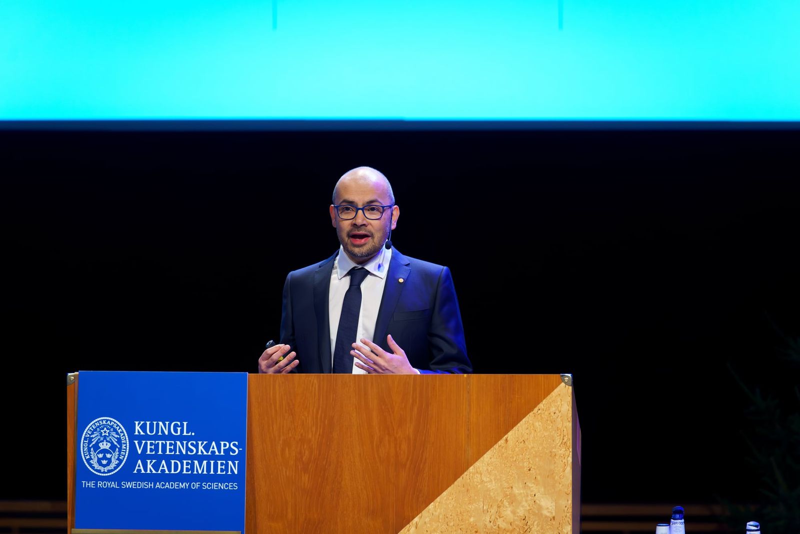 Demis Hassabis, who received the Nobel Prize in Chemistry in 2024, addresses an event at the Royal Swedish Academy of Sciences.