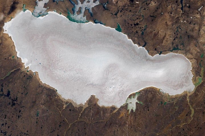 Arctic ice expanded for two millennia before greenhouse warming reversed it