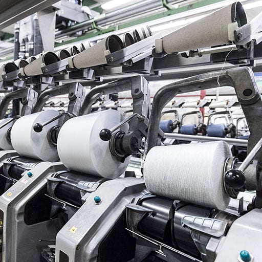 Recyclable elastic yarn made from milk-jug plastic could reduce landfill clothing waste